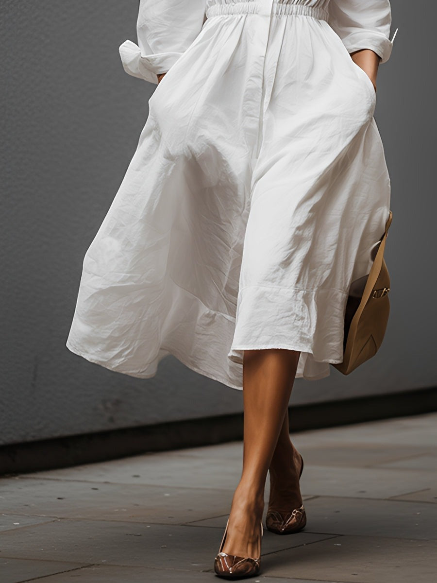 Elegante e intramontabile abito in lino con colletto a camicia e vita elasticizzata