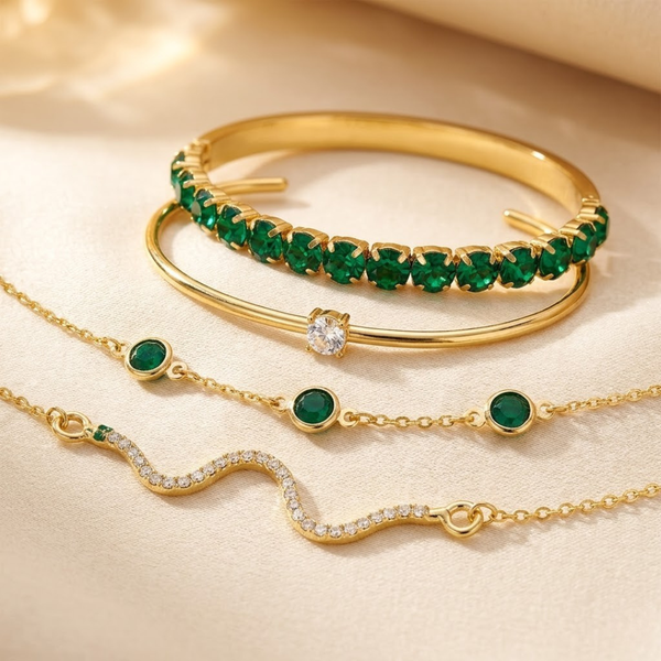 Set di bracciali in oro con smeraldo