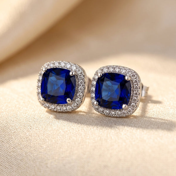 Orecchini a bottone halo in zaffiro in argento