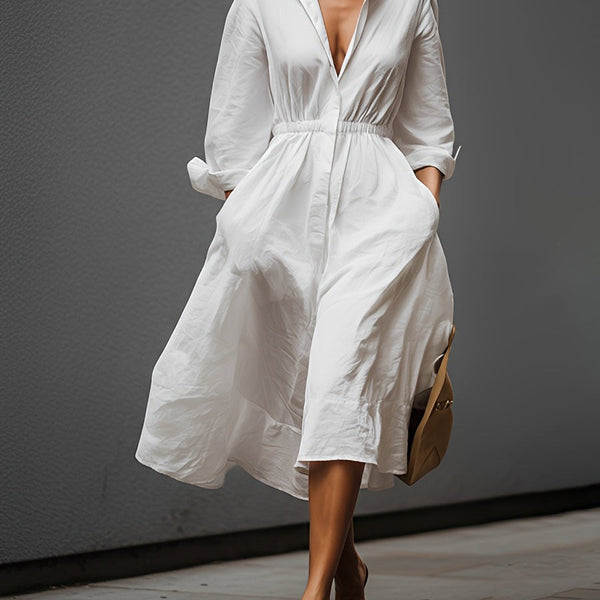 Elegante e intramontabile abito in lino con colletto a camicia e vita elasticizzata