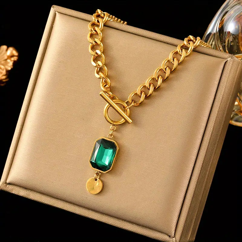 Collana a catena in oro con smeraldo