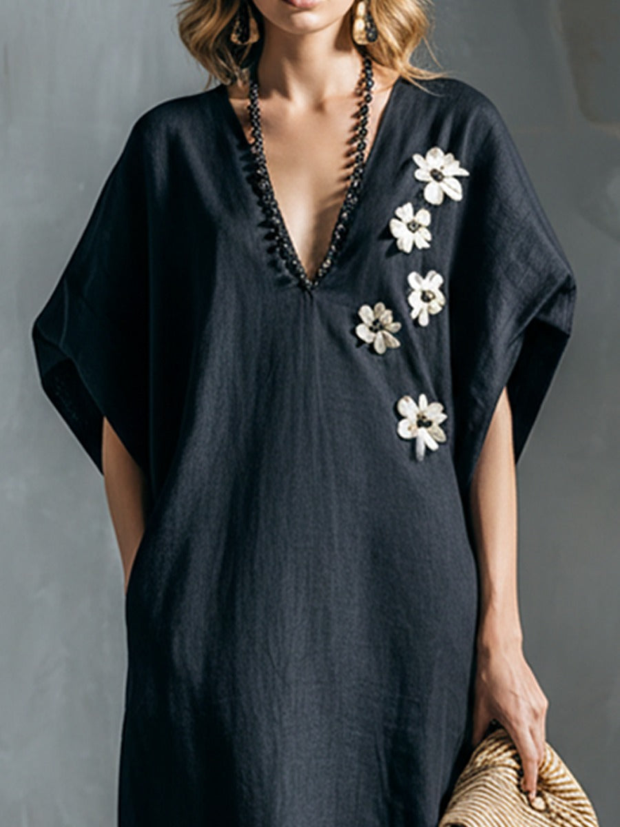 Abito caftano in cotone e lino nero con fiori bianchi