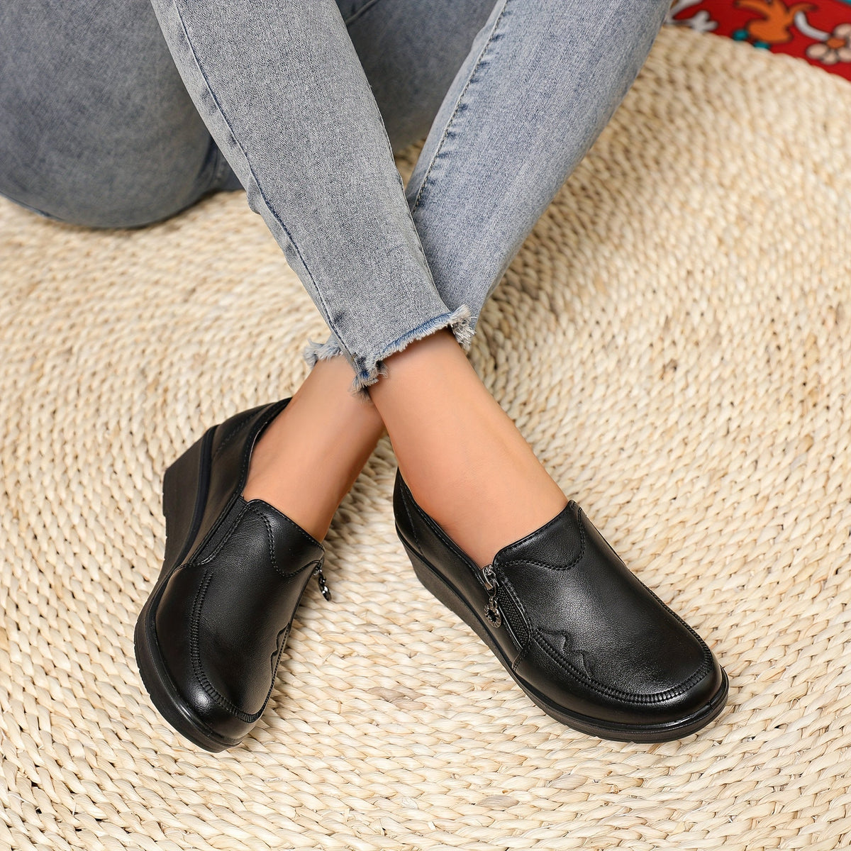 Harriet™ | Mocassini con zip laterale e tacco