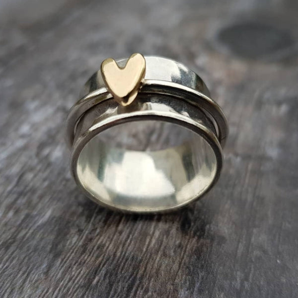 Anello d'argento con cuore d'oro