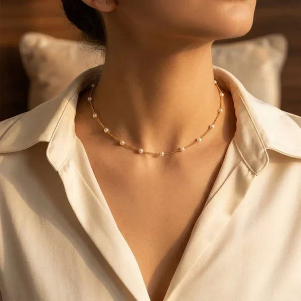 Collana con perle distanziate in oro
