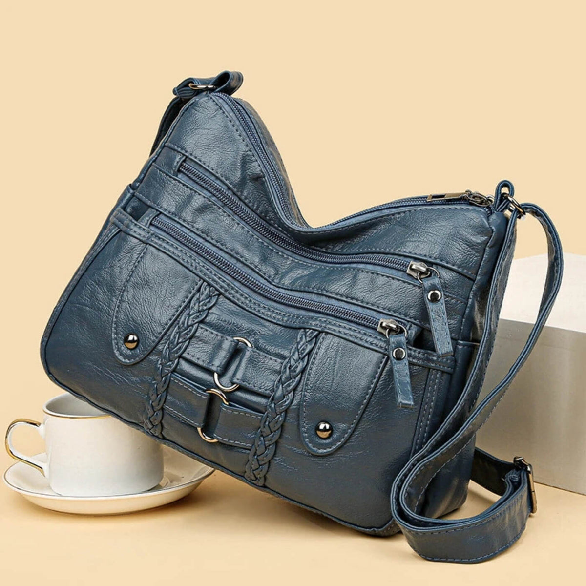Borsa a tracolla Monica intrecciata multi-zip
