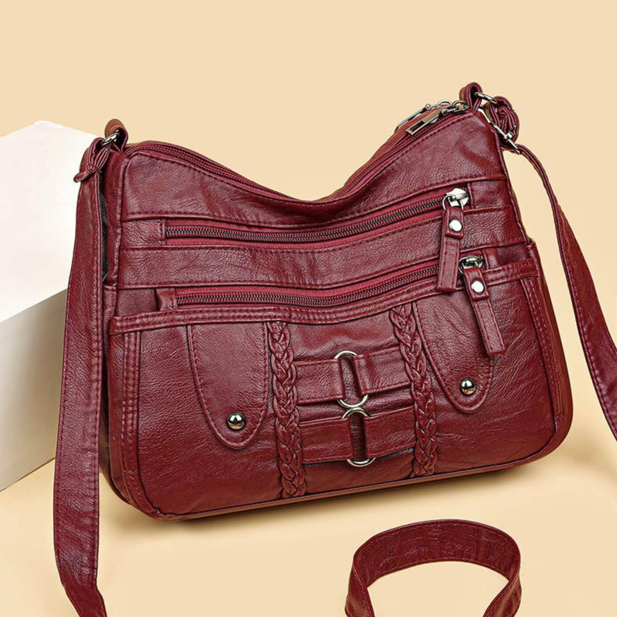 Borsa a tracolla Monica intrecciata multi-zip