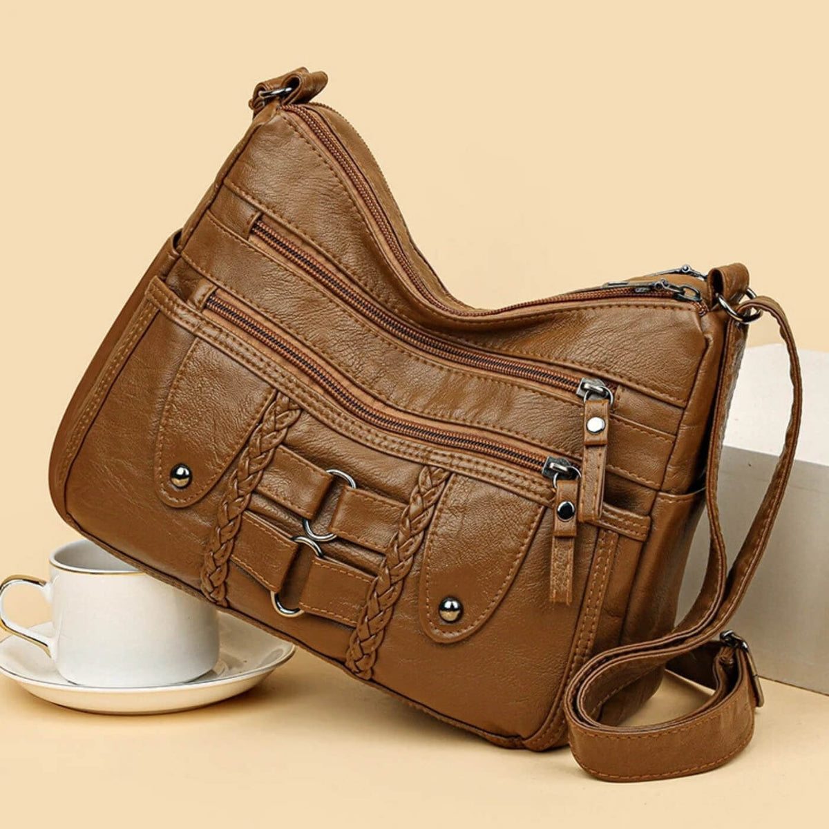 Borsa a tracolla Monica intrecciata multi-zip