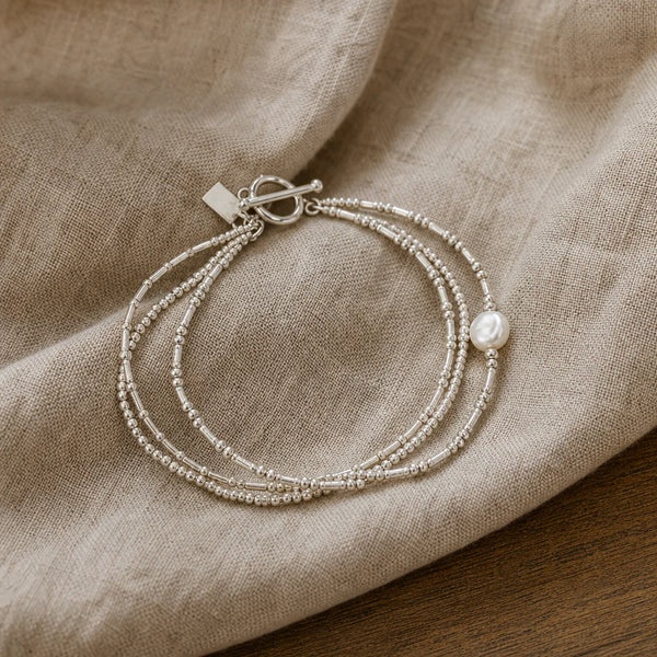 Confezione di braccialetti vintage con perle
