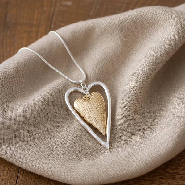 Collana vintage con ciondolo a cuore in argento e oro opaco