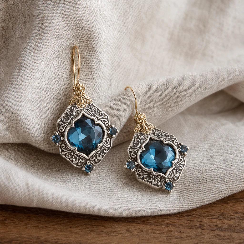 Orecchini vintage in oro e argento con cristalli blu