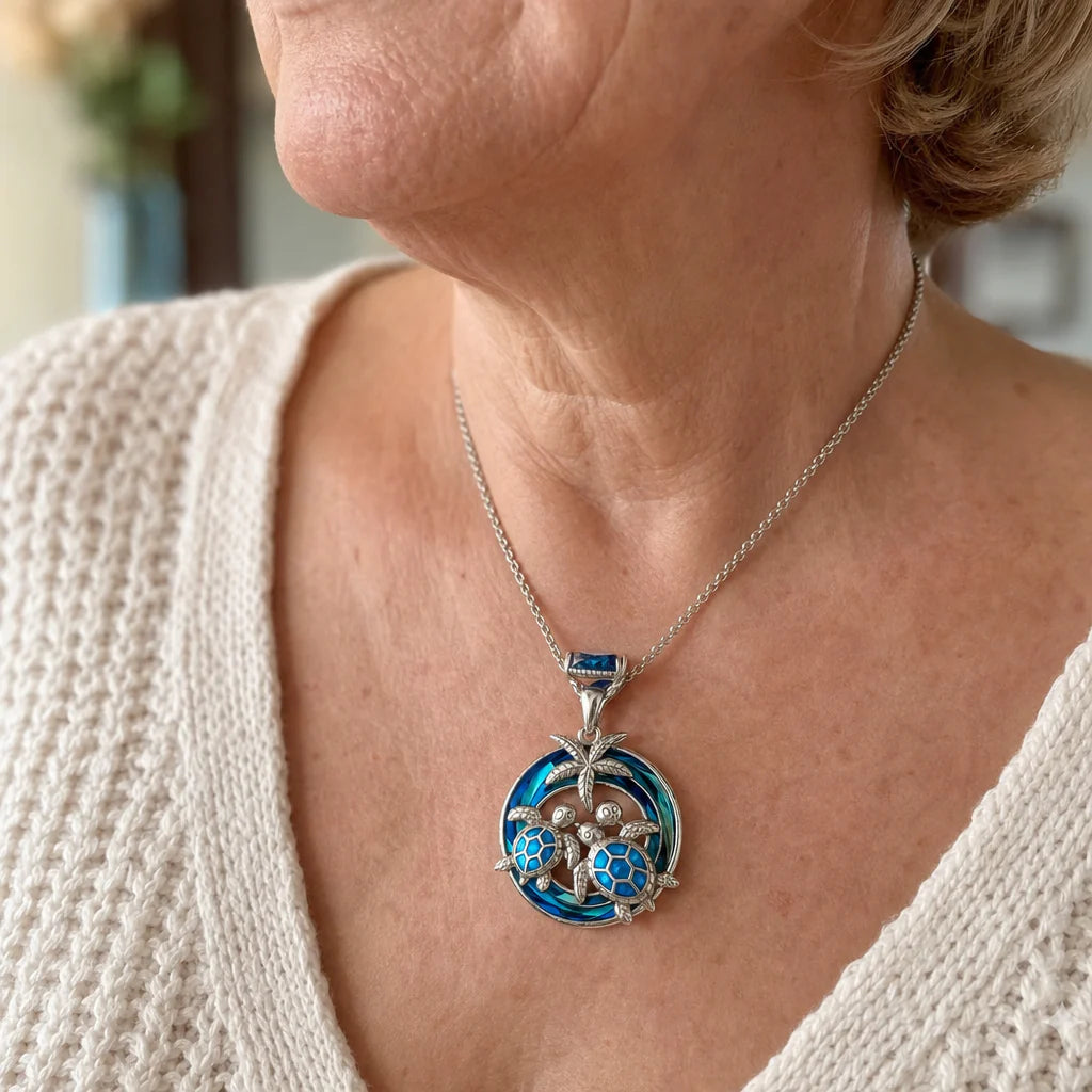 Collana con cerchio di opale e palma a forma di tartaruga