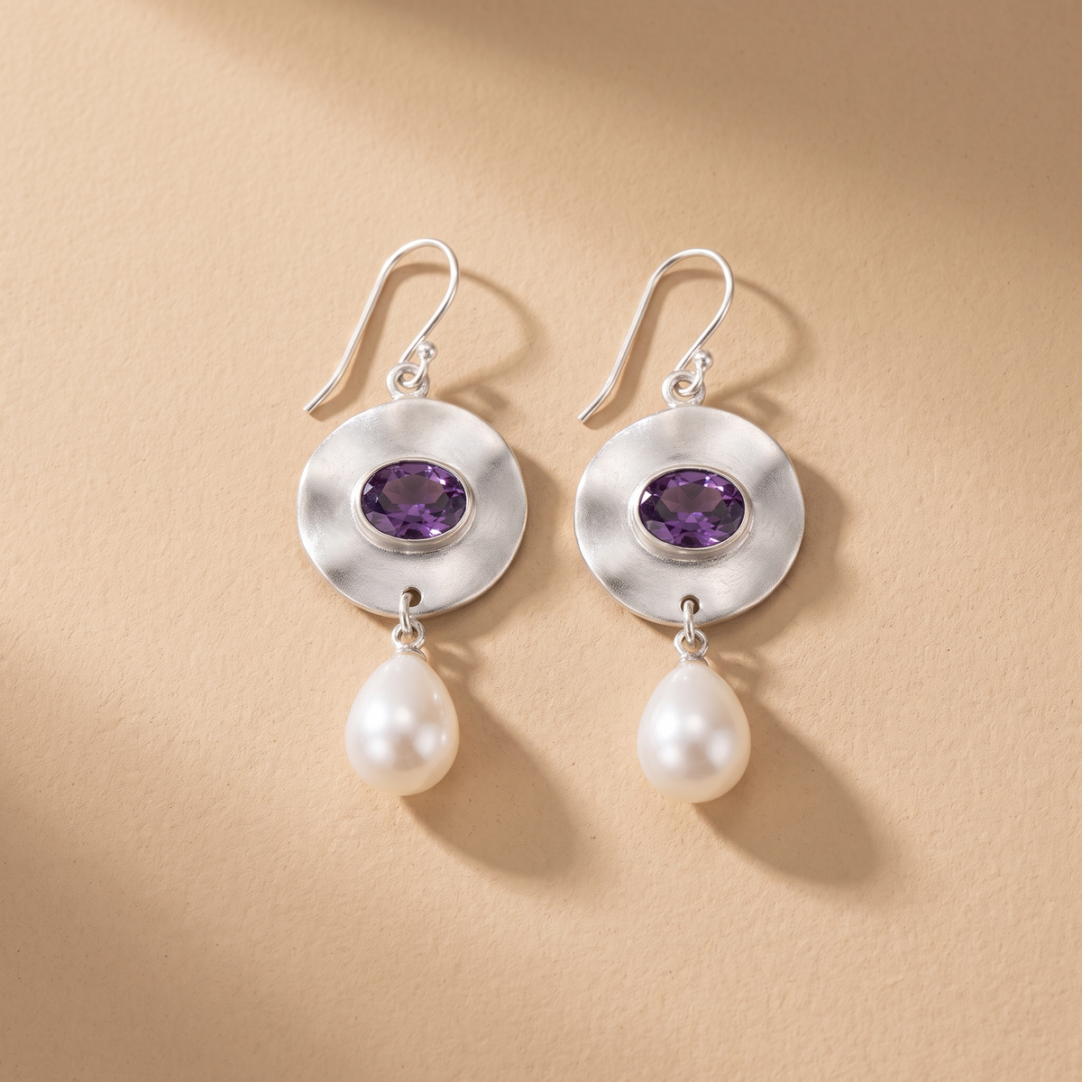 Orecchini in Perla con Zirconia Viola