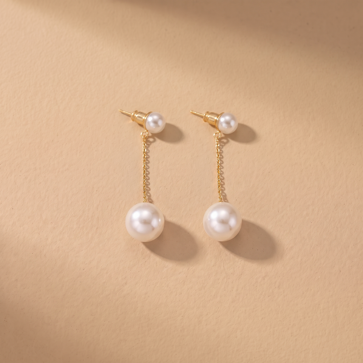 Orecchini Eleganti con Perle Pendenti in Oro