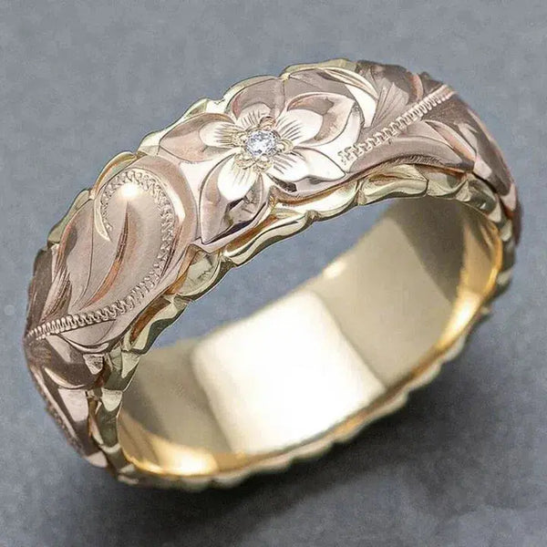 Anello in oro a forma di rosa d'ispirazione antica
